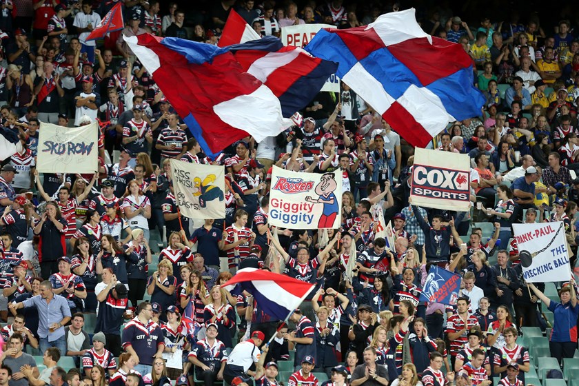 Sign of the Times: Wayne Leong - pictured front and centre with a trademark banner - is one of the more parochial Members of the Chookpen - the Club's official cheer squad. 