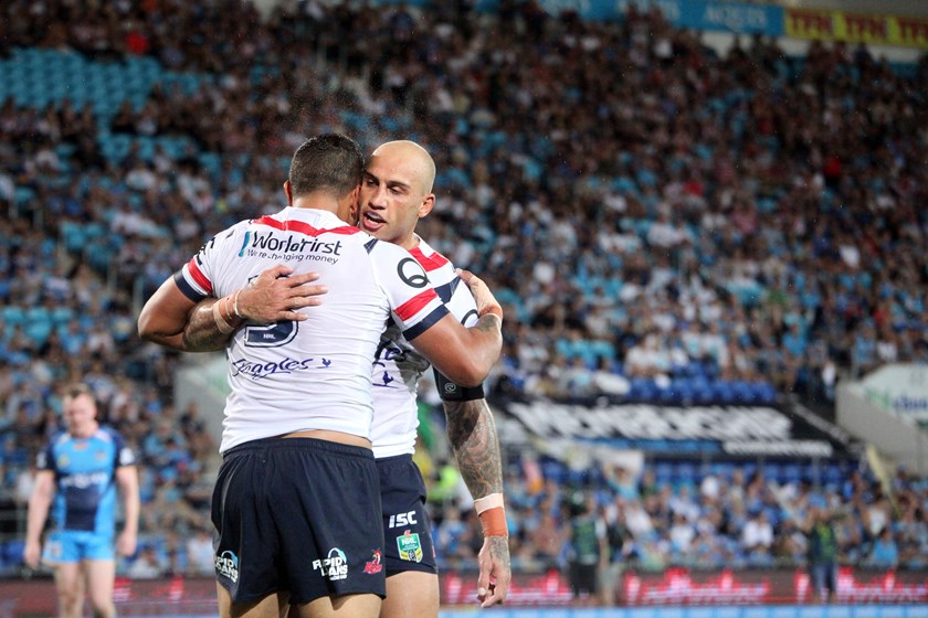 Blake Furguson celebrates with Latrell Mitchell at Cbus Super Stadium in Round 1, 2017